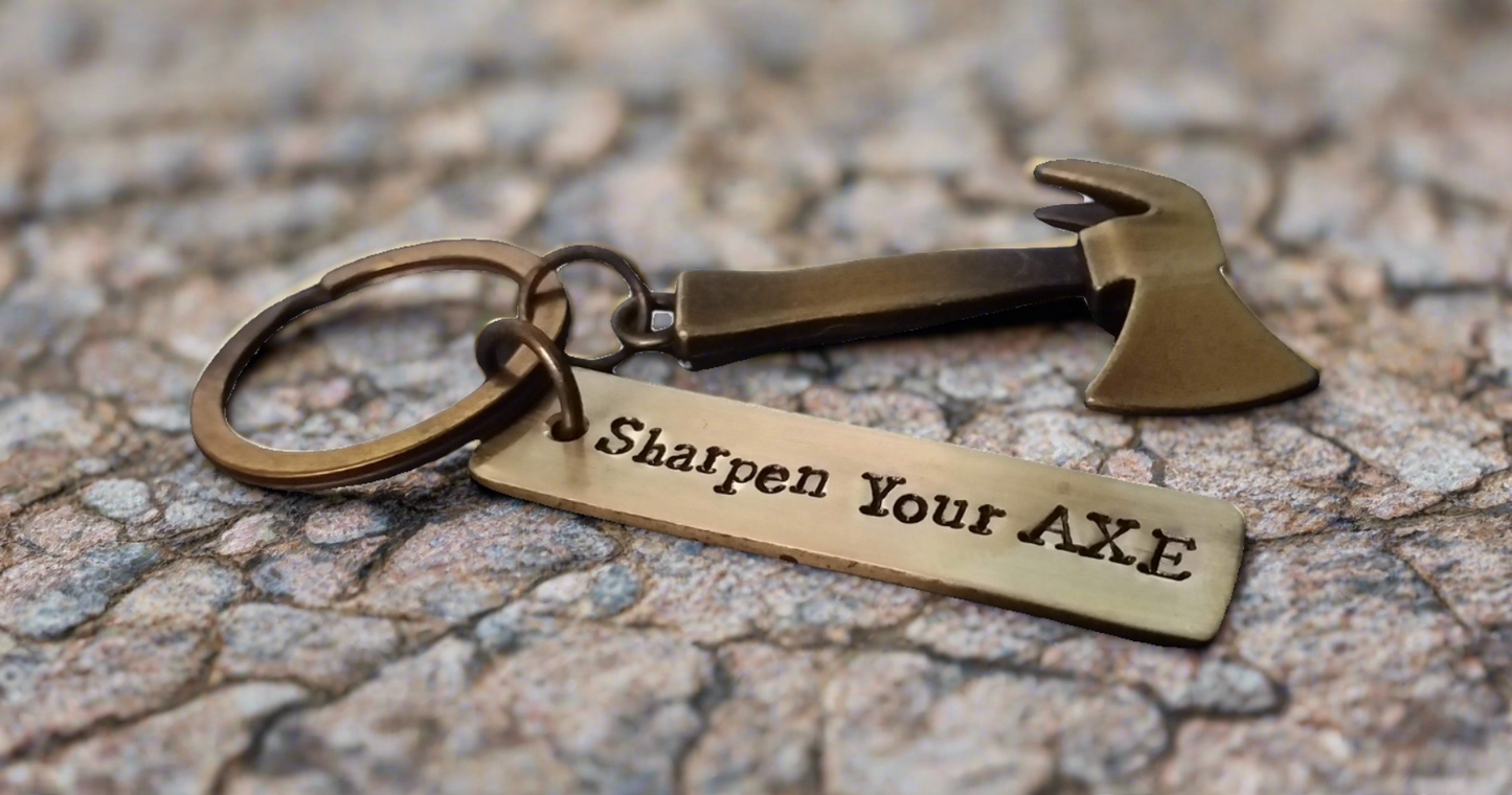 Streetsoul Sharpen Your Axe Keyring with stamped brass tag 2 inches length.