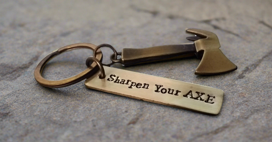 Streetsoul Sharpen Your Axe Keyring with stamped brass tag 2 inches length.