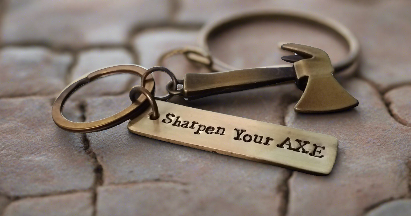 Streetsoul Sharpen Your Axe Keyring with stamped brass tag 2 inches length.
