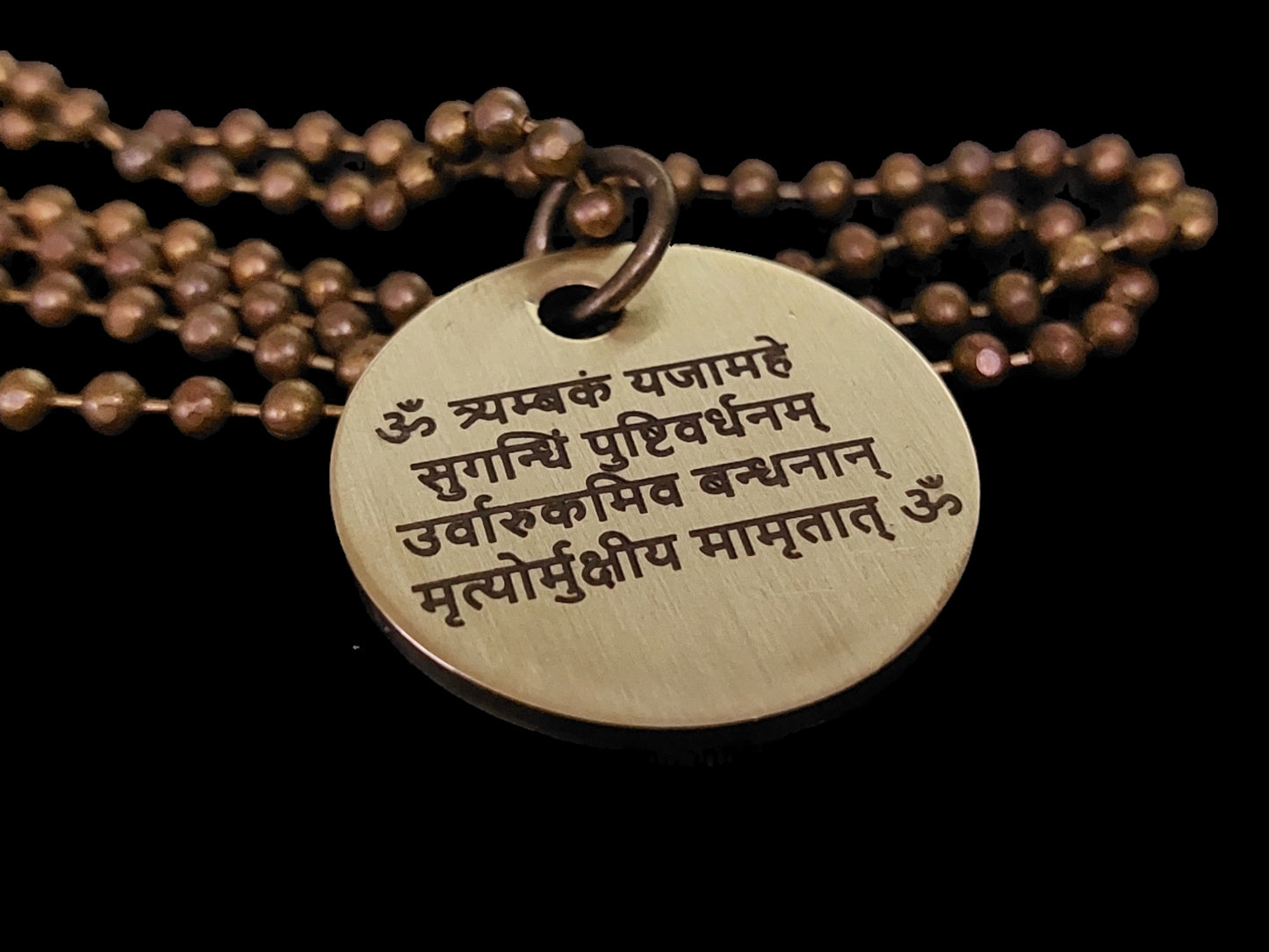 Lord Shiva's Pure Brass Pendant with Om and Mahamrityunjaya mantra engraved.