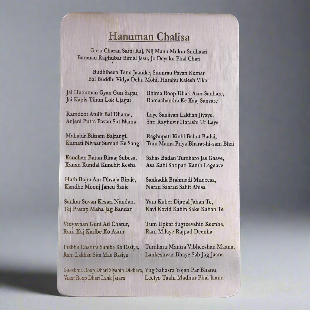 Hanuman Chalisa prayer card on a keyboard