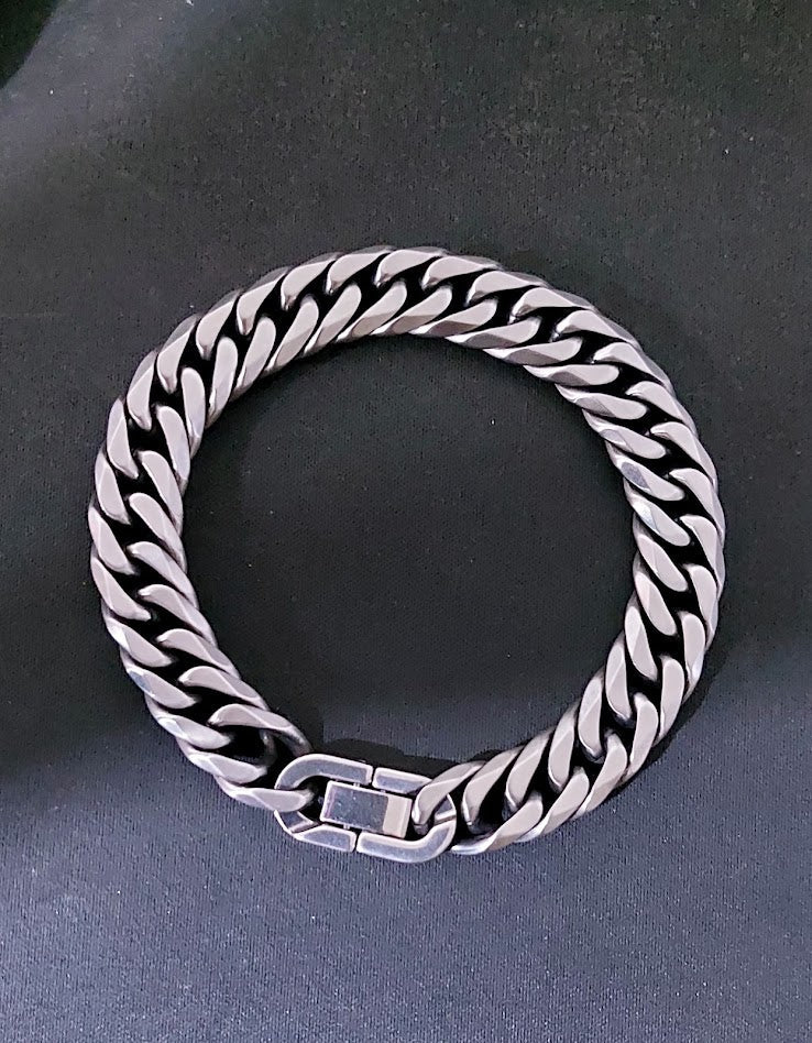 Cuban link bracelet worn on wrist lifestyle shot