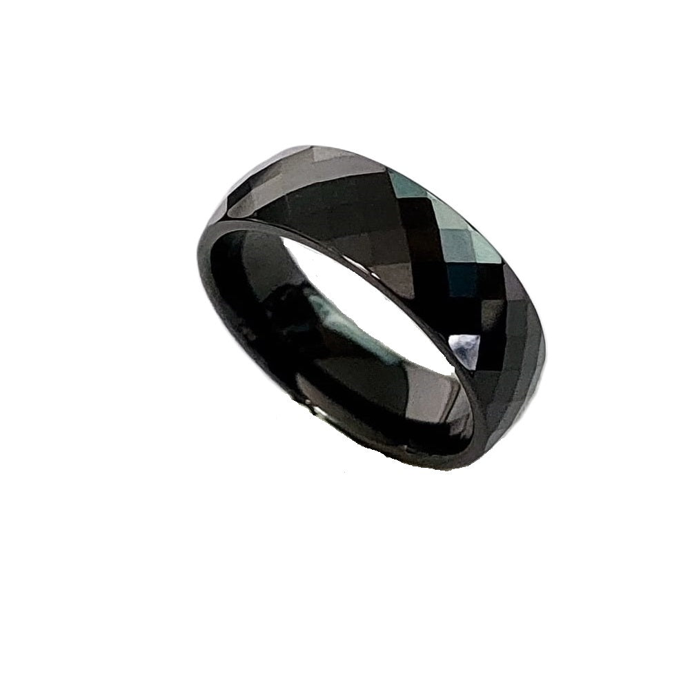 Classic Wide black ceramic ring, faceted band, studio angle shot