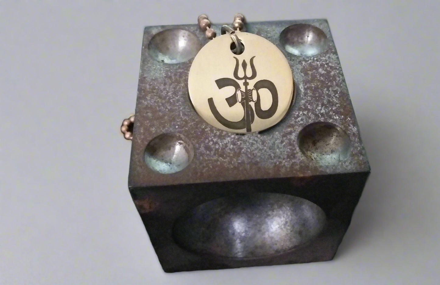 Lord Shiva's Pure Brass Pendant with Om and Mahamrityunjaya mantra engraved.